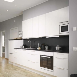 Photo Of A Gray Kitchen Combined With White