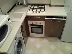 Kitchen Design With Refrigerator And Washing Machine And Gas Stove