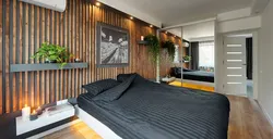 Bedroom design with slats on the wall