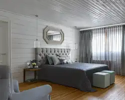Bedroom design with lining on the ceiling