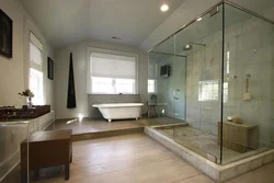 Ванна с душевой кабиной и окном фото