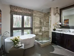 Ванна с душевой кабиной и окном фото