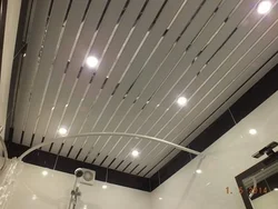Bathroom interior with slatted ceiling