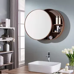 Round mirror in the bathroom interior