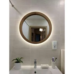 Round Mirror In The Bathroom Interior