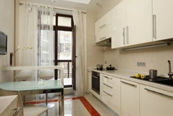 Kitchen design with window and three doors