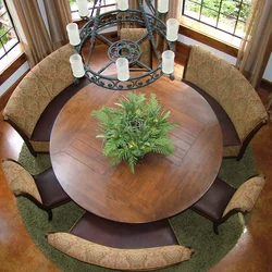 Round wooden table in the kitchen interior