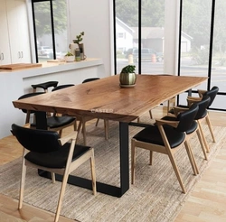 Round wooden table in the kitchen interior