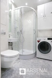 Small bathroom design with shower and washing machine
