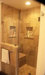 Photo of a bathroom with a tray instead of a bathtub