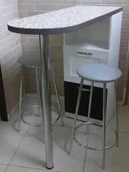 Table as a bar counter for a small kitchen photo