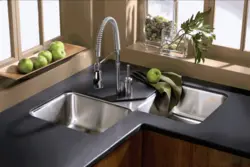 Corner sink in the kitchen in the interior