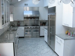 Light kitchen with gray countertop photo