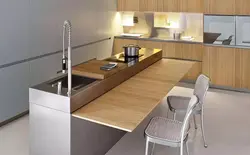 Дизайн кухни со столом столешницей