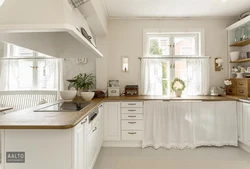 Kitchen Living Room With Sink By The Window In The House Photo