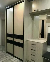 Wardrobes for a long hallway in an apartment photo