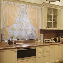 Beige kitchen curtains in the interior