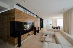 Photo Of A Living Room With A TV On The Wall