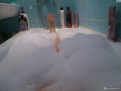 Photo Of Men In Foam In Bathtub