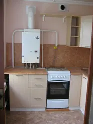 Interior of a small kitchen with a boiler