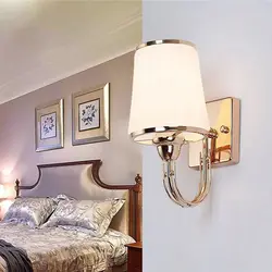 Sconce Lamp On The Wall In The Bedroom Photo