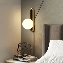Sconce lamp on the wall in the bedroom photo