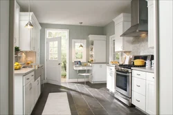 Белая кухня с серым полом в интерьере