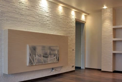 Modern design of walls in an apartment with plaster