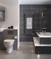 Bathroom design with gray tiles on the floor