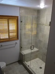 Shower corner in a small bathroom real photos