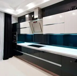Photo Of A Kitchen With A Black Panel