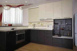 Photo of a kitchen with a black panel