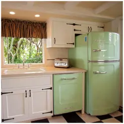 Green refrigerator in the kitchen photo