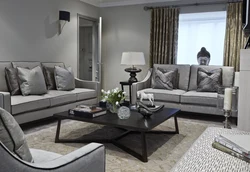 Мебель в интерьере гостиной с серыми обоями