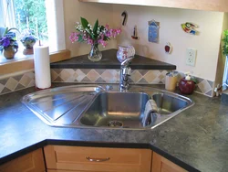 Kitchen design with a corner sink in a modern style