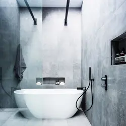Black Bathtub Faucets In The Interior Photo