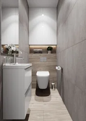 Toilet With Washbasin In The Apartment Photo