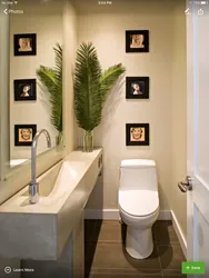 Toilet with washbasin in the apartment photo