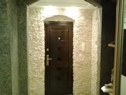 Decorating doors with decorative stone in an apartment photo