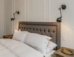 Sockets above the bedside table in the bedroom photo