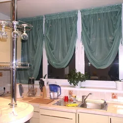 French curtains in the kitchen interior