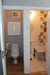 Toilet and bathroom in the hallway photo
