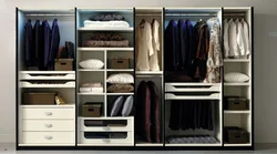 Interior filling of a wardrobe in a bedroom photo