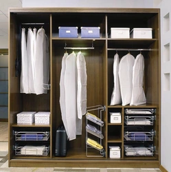 Interior filling of a wardrobe in a bedroom photo