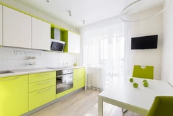Beige-green kitchen in the interior