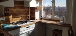 Kitchen design in Khrushchev with a window sill photo