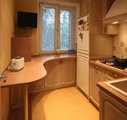 Дизайн кухни в хрущевке с подоконником фото