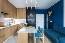 Blue sofa in the kitchen interior photo