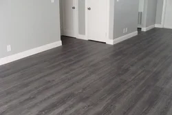 Gray floor in the bedroom interior
