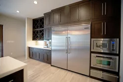 Free-Standing Refrigerator In The Interior Of The Kitchen Living Room